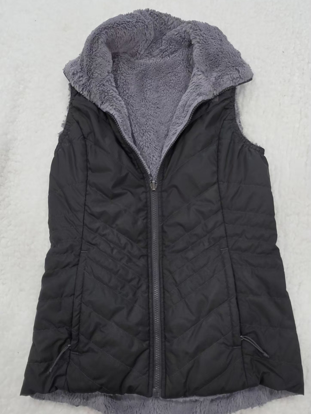 The North Face Black Quilted Vest with Gray Plush Lining